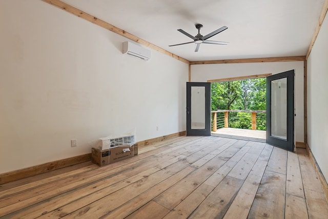 43 Old Federal Rd, Talking Rock, GA 30175 - unfurnished room featuring a wall mounted AC, wood-type flooring, ceiling fan, and baseboards
