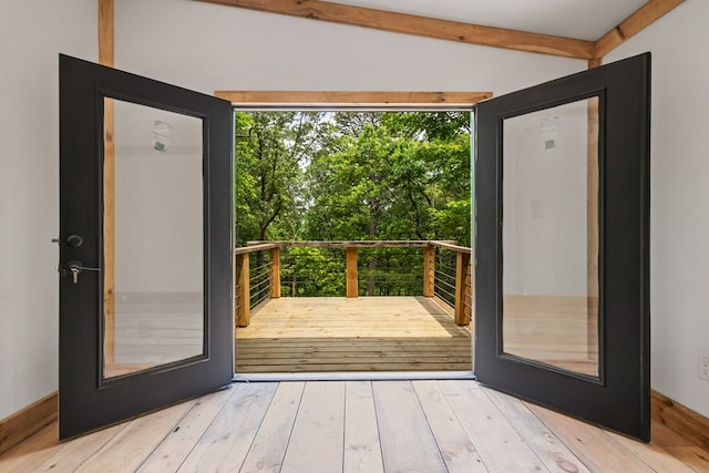 43 Old Federal Rd, Talking Rock, GA 30175 - doorway to outside with hardwood / wood-style floors, beamed ceiling, and view of wooded area