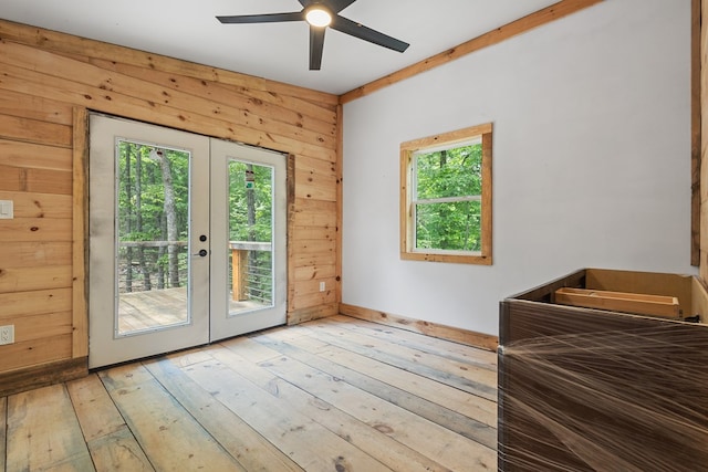 43 Old Federal Rd, Talking Rock, GA 30175 - entryway featuring french doors, healthy amount of natural light, a ceiling fan, light wood-type flooring, and wood walls
