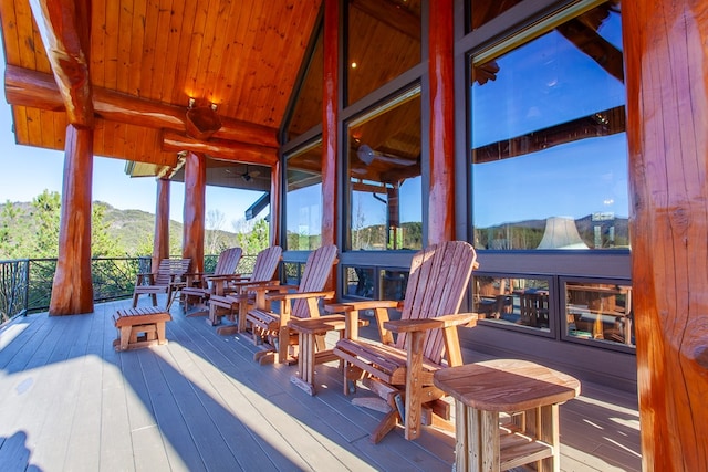 wooden terrace with a mountain view