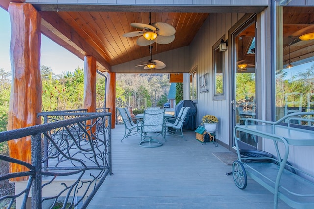 view of patio / terrace featuring a deck and ceiling fan