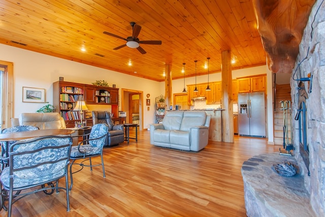 living room featuring light hardwood / wood-style flooring, ceiling fan, and wood ceiling