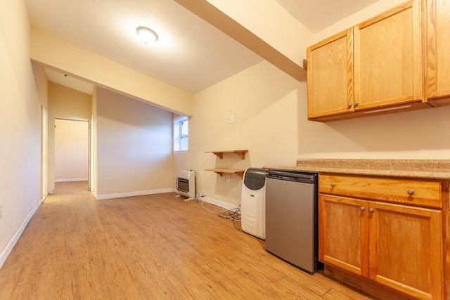 kitchen featuring heating unit, refrigerator, light hardwood / wood-style floors, and vaulted ceiling