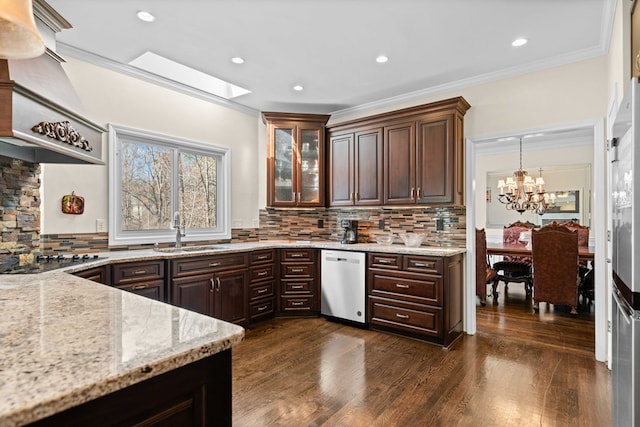 735 Amberton Close, Suwanee, GA 30024 - kitchen with dishwasher, a sink, black electric cooktop, a chandelier, and backsplash
