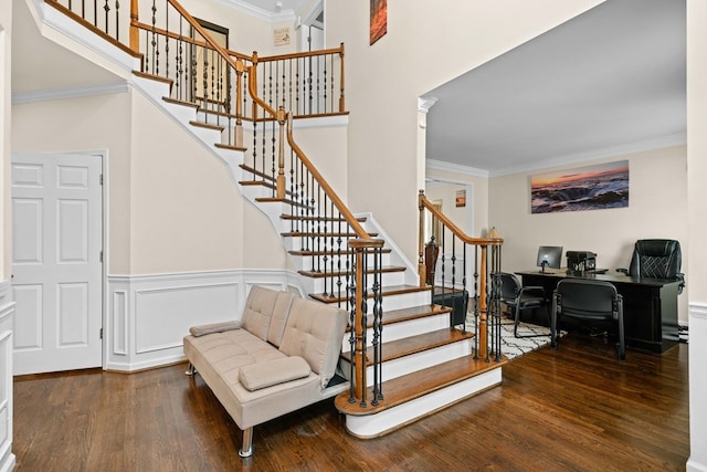735 Amberton Close, Suwanee, GA 30024 - stairs with wood finished floors, ornamental molding, a towering ceiling, and a wainscoted wall