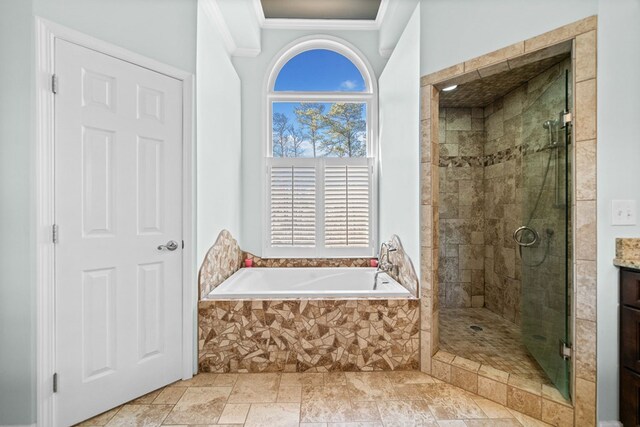 735 Amberton Close, Suwanee, GA 30024 - bathroom with a garden tub, a stall shower, vanity, ornamental molding, and stone finish floors