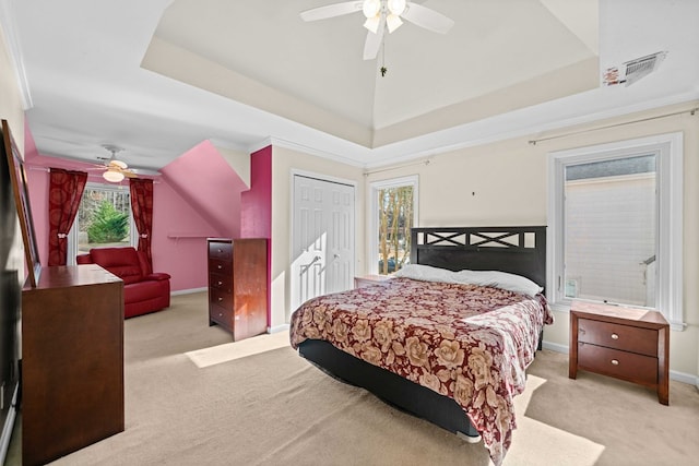 735 Amberton Close, Suwanee, GA 30024 - carpeted bedroom with a raised ceiling, a ceiling fan, a closet, and baseboards