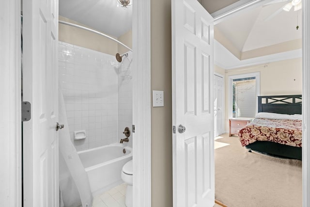 735 Amberton Close, Suwanee, GA 30024 - bathroom featuring washtub / shower combination, toilet, ensuite bath, a ceiling fan, and tile patterned floors