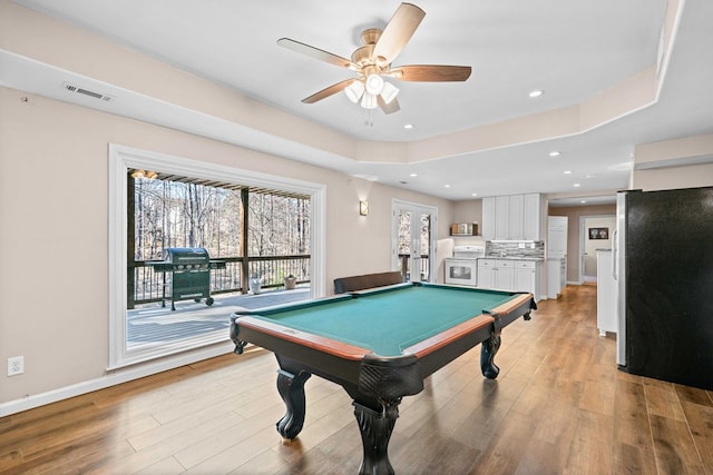 735 Amberton Close, Suwanee, GA 30024 - recreation room featuring ceiling fan, light wood finished floors, billiards table, recessed lighting, and a tray ceiling