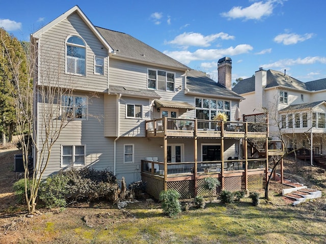 735 Amberton Close, Suwanee, GA 30024 - back of property featuring a wooden deck, central air condition unit, french doors, and a chimney