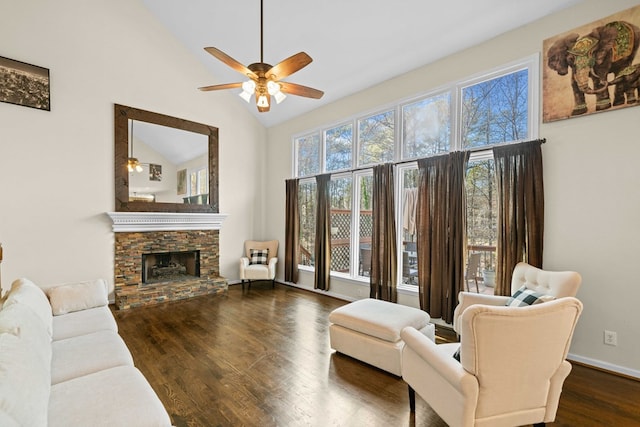 735 Amberton Close, Suwanee, GA 30024 - living room with high vaulted ceiling, a ceiling fan, wood finished floors, a fireplace, and baseboards
