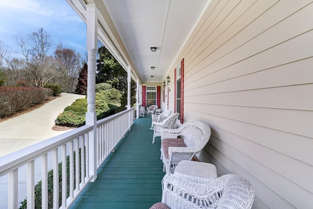 balcony featuring covered porch