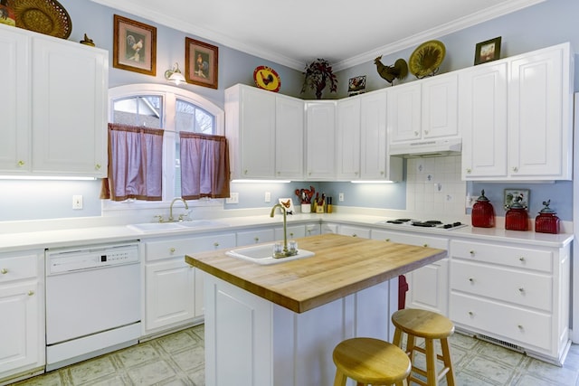 kitchen featuring butcher block countertops, white appliances, white cabinets, sink, and a kitchen island