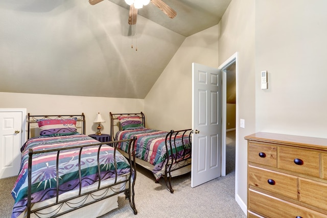 bedroom with light carpet, ceiling fan, and vaulted ceiling