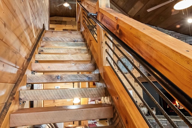 stairs with wooden ceiling