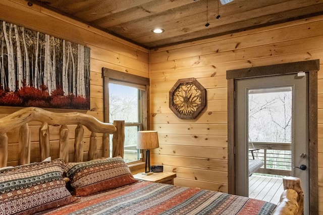 bedroom with hardwood / wood-style floors and wood ceiling