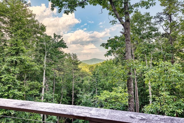 mountain view featuring a view of trees