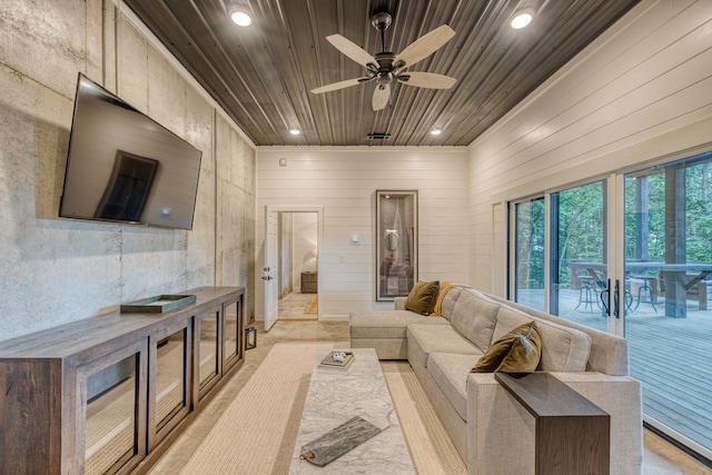 living area featuring recessed lighting, ceiling fan, and wood ceiling