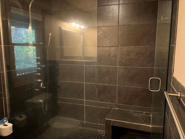 bathroom featuring an enclosed shower