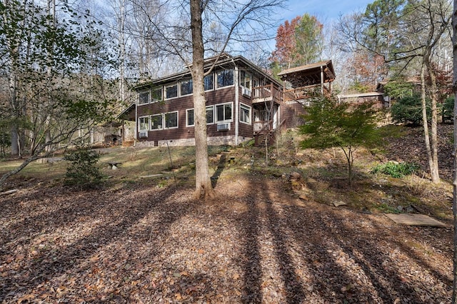 rear view of house with a deck