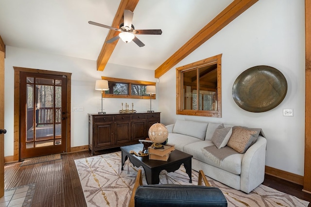 living room featuring bar, ceiling fan, lofted ceiling with beams, and hardwood / wood-style flooring