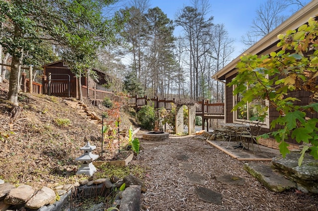 view of yard featuring a wooden deck