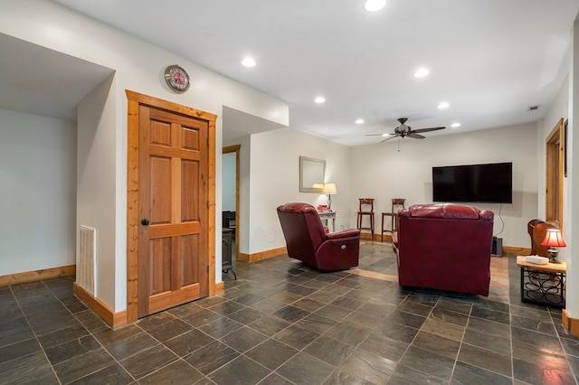 living room featuring ceiling fan