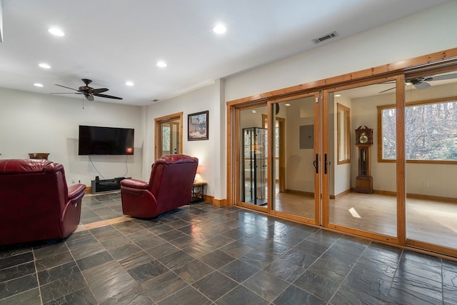 living room featuring ceiling fan