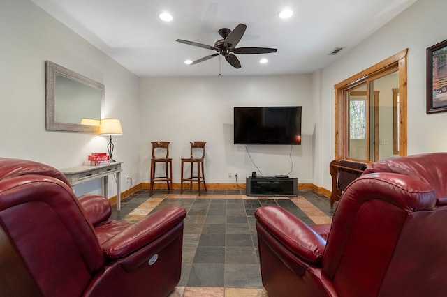 living room featuring ceiling fan