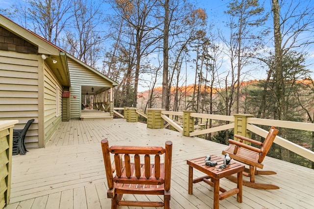 wooden deck with a mountain view