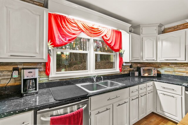 101 Harper Vly, Ellijay, GA 30540 - kitchen with a sink, dishwasher, white cabinetry, ornamental molding, and decorative backsplash
