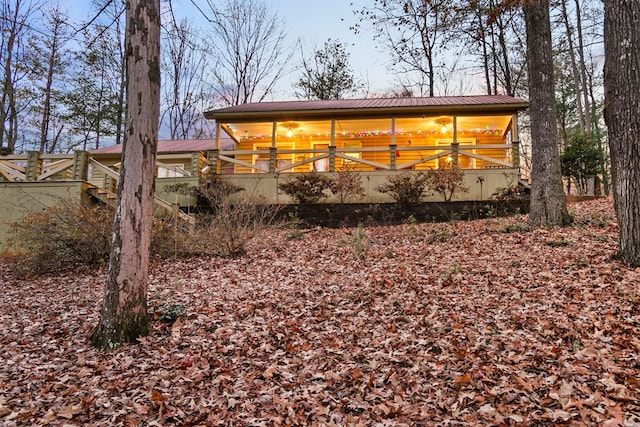 101 Harper Vly, Ellijay, GA 30540 - rear view of house with metal roof and a sunroom