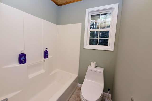 bathroom with toilet and a bath