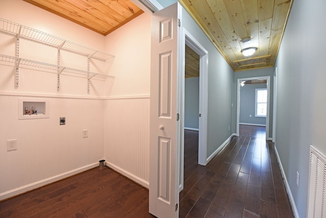 laundry area with dark wood-type flooring, washer hookup, electric dryer hookup, and wooden ceiling