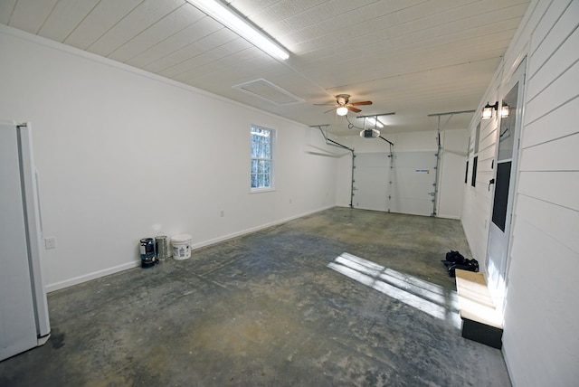 garage featuring a garage door opener and fridge