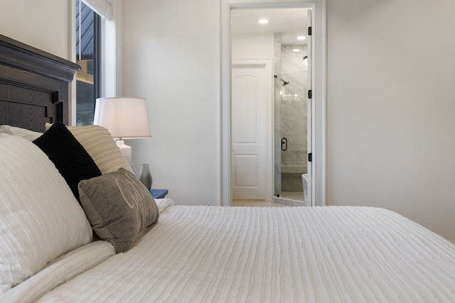 bedroom featuring ensuite bath