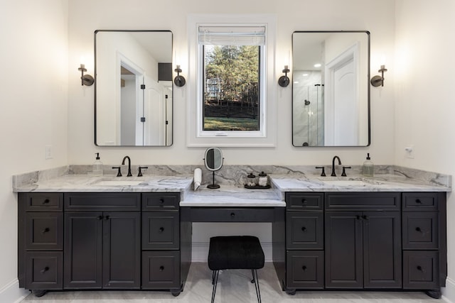 full bathroom featuring vanity and a shower