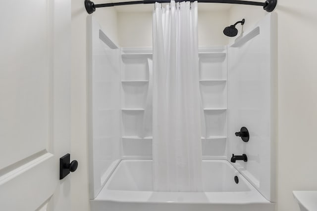 full bathroom with shower / bath combo with shower curtain