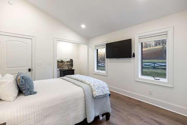 bedroom featuring recessed lighting, baseboards, lofted ceiling, and dark wood-style floors