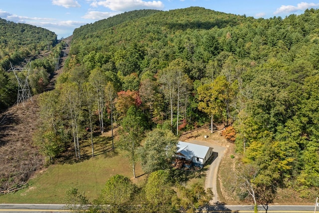 drone / aerial view featuring a mountain view