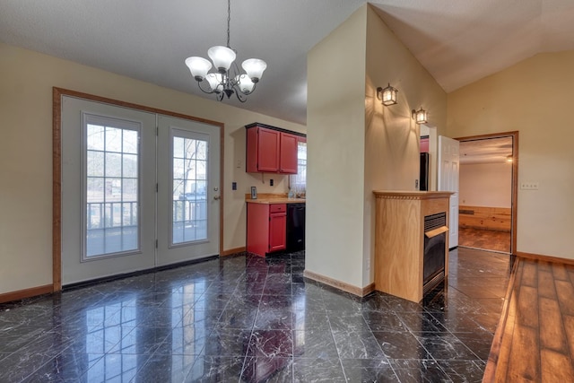 interior space featuring a notable chandelier, black dishwasher, and lofted ceiling