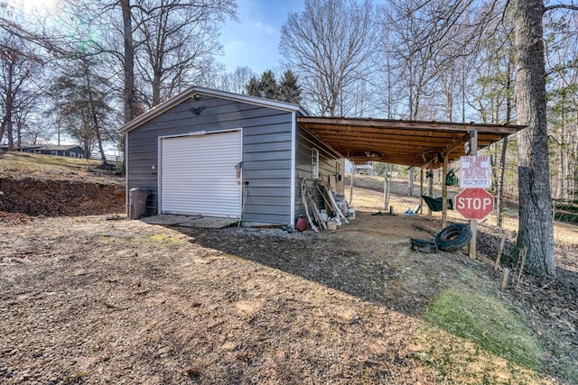 view of outdoor structure with a garage