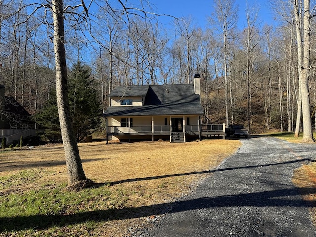 farmhouse inspired home with covered porch