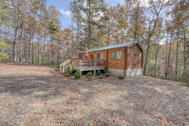 view of front of home with a deck