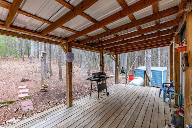 wooden deck with a storage unit