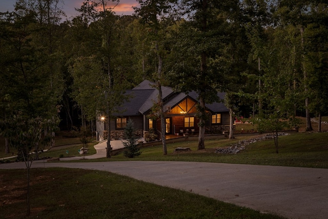 view of front of property with a lawn