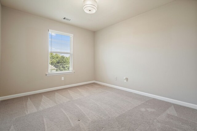 6665 Flagstone Ct, Cumming, GA 30028 - carpeted spare room with baseboards