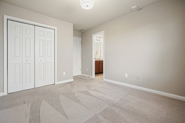 6665 Flagstone Ct, Cumming, GA 30028 - unfurnished bedroom with light colored carpet, a closet, and ensuite bathroom