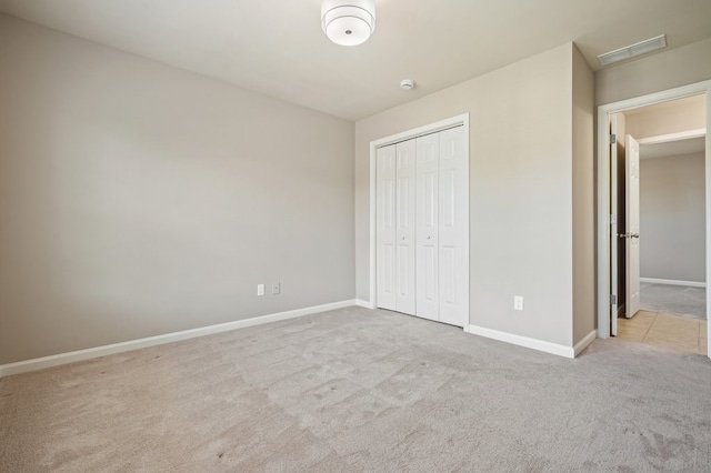 6665 Flagstone Ct, Cumming, GA 30028 - unfurnished bedroom with carpet floors and a closet