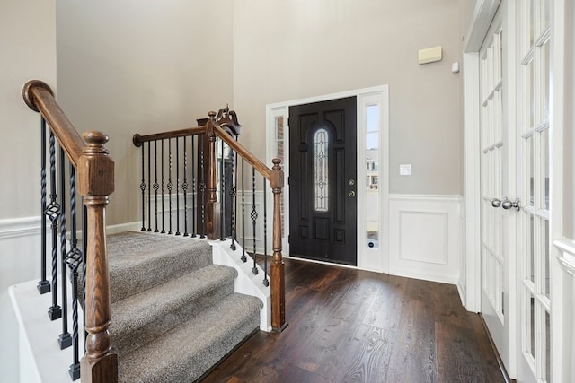 6665 Flagstone Ct, Cumming, GA 30028 - entryway featuring wood finished floors, stairway, a wainscoted wall, and a decorative wall